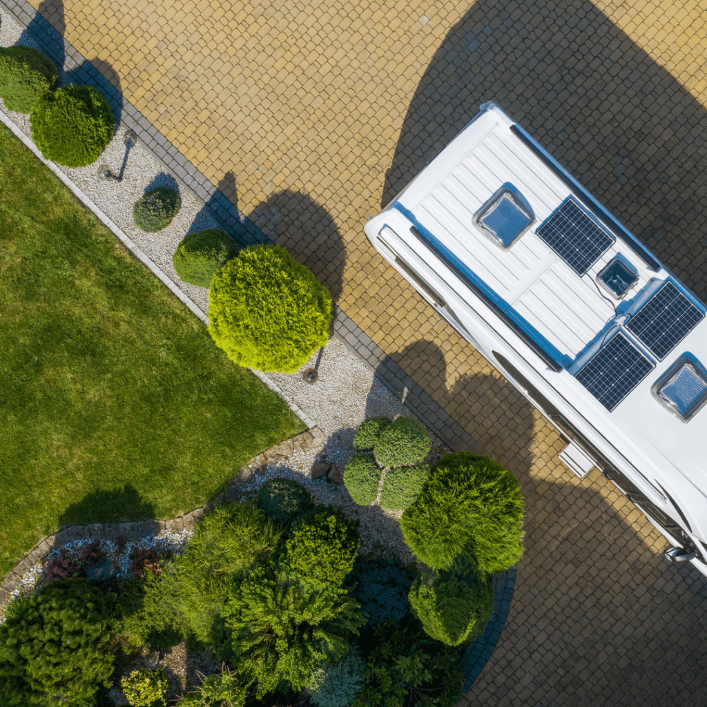 Aerial shot of a RV moochdocking in a driveway entry